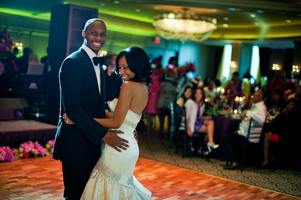 the happy couple dancing their first dance at the reception